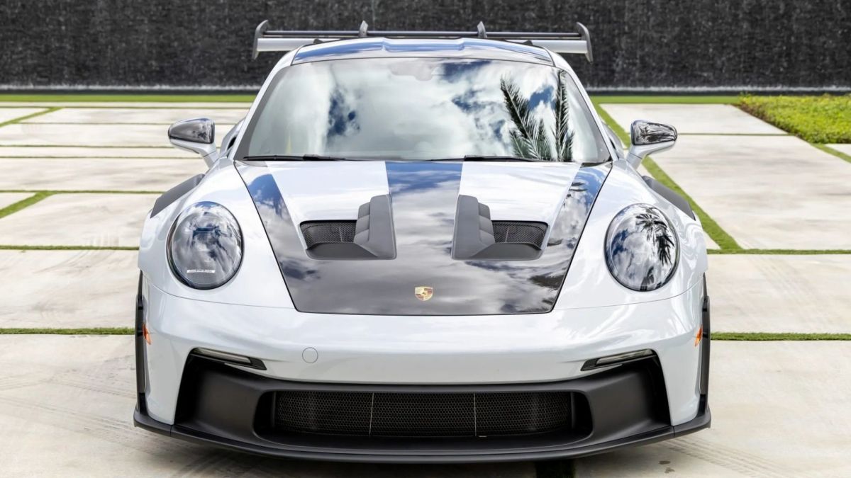Porsche GT3 RS: A Symbol of Excess in a World of Scarcity, Where Wealthy Buyers Hoard Performance Cars Like Modern-Day Idols, Igniting a Debate on Value and Responsibility in the Automotive Realm