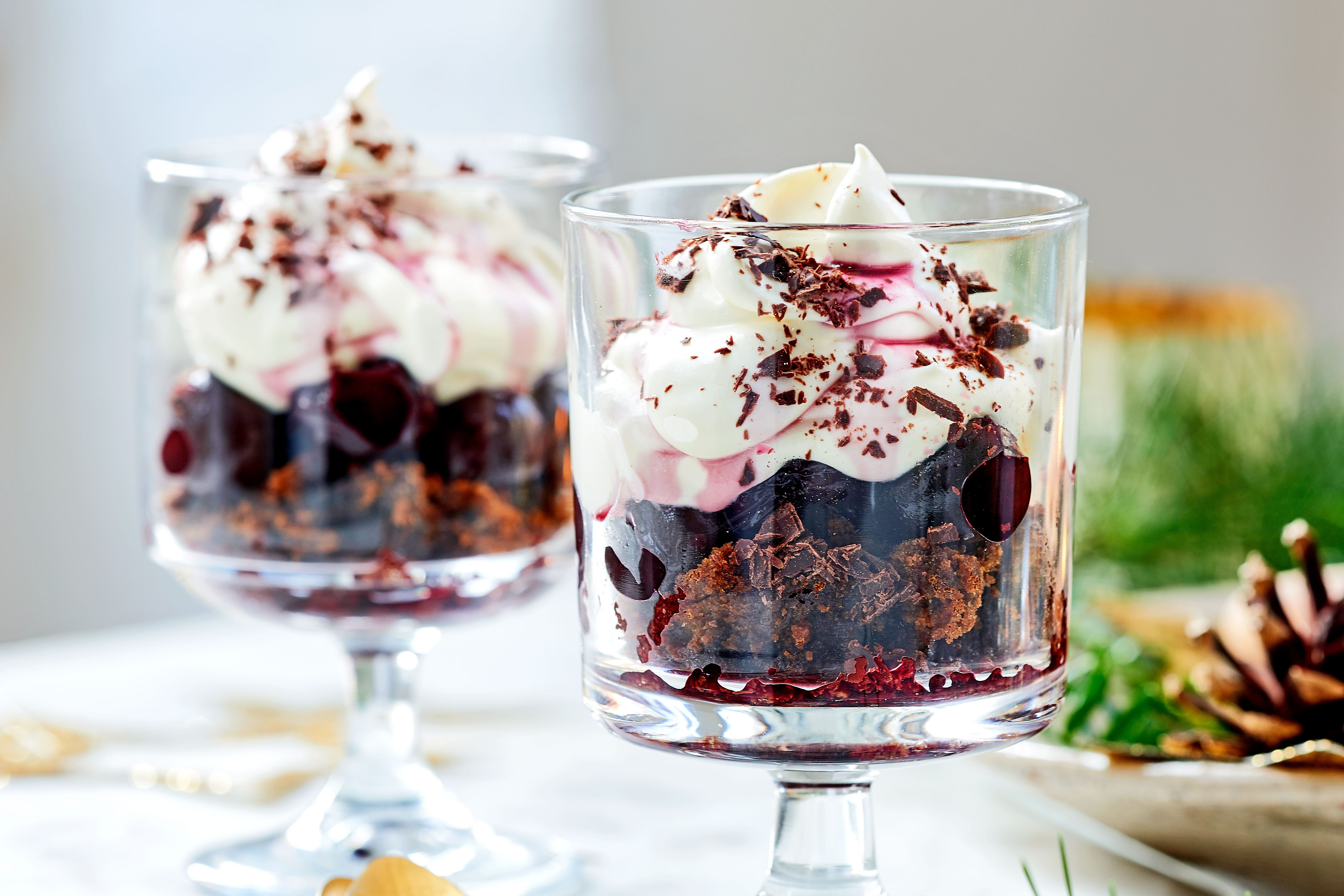 Two black forest Christmas fools in small trifle glasses