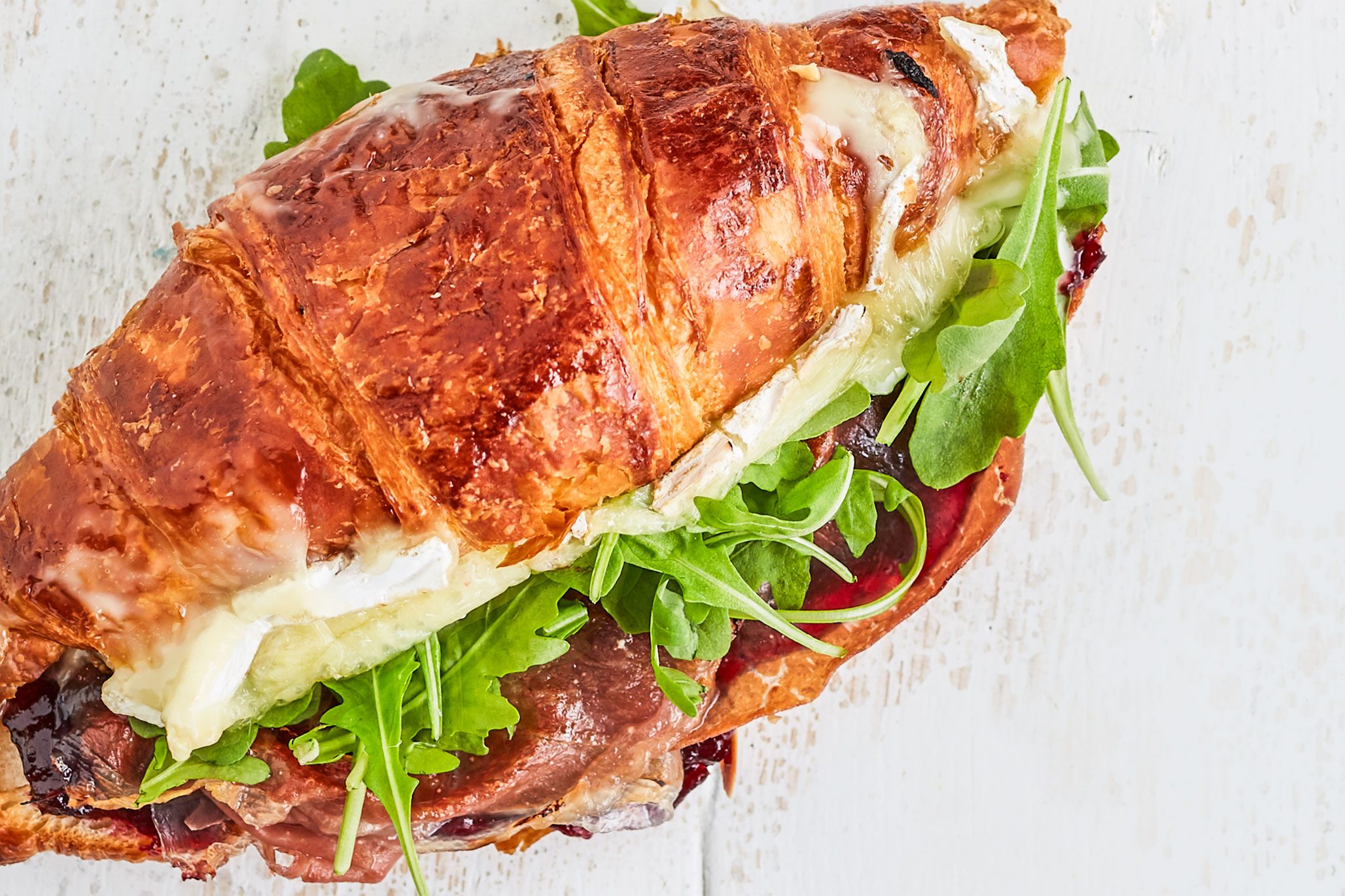 Prosciutto, cramberry & brie filled croissant