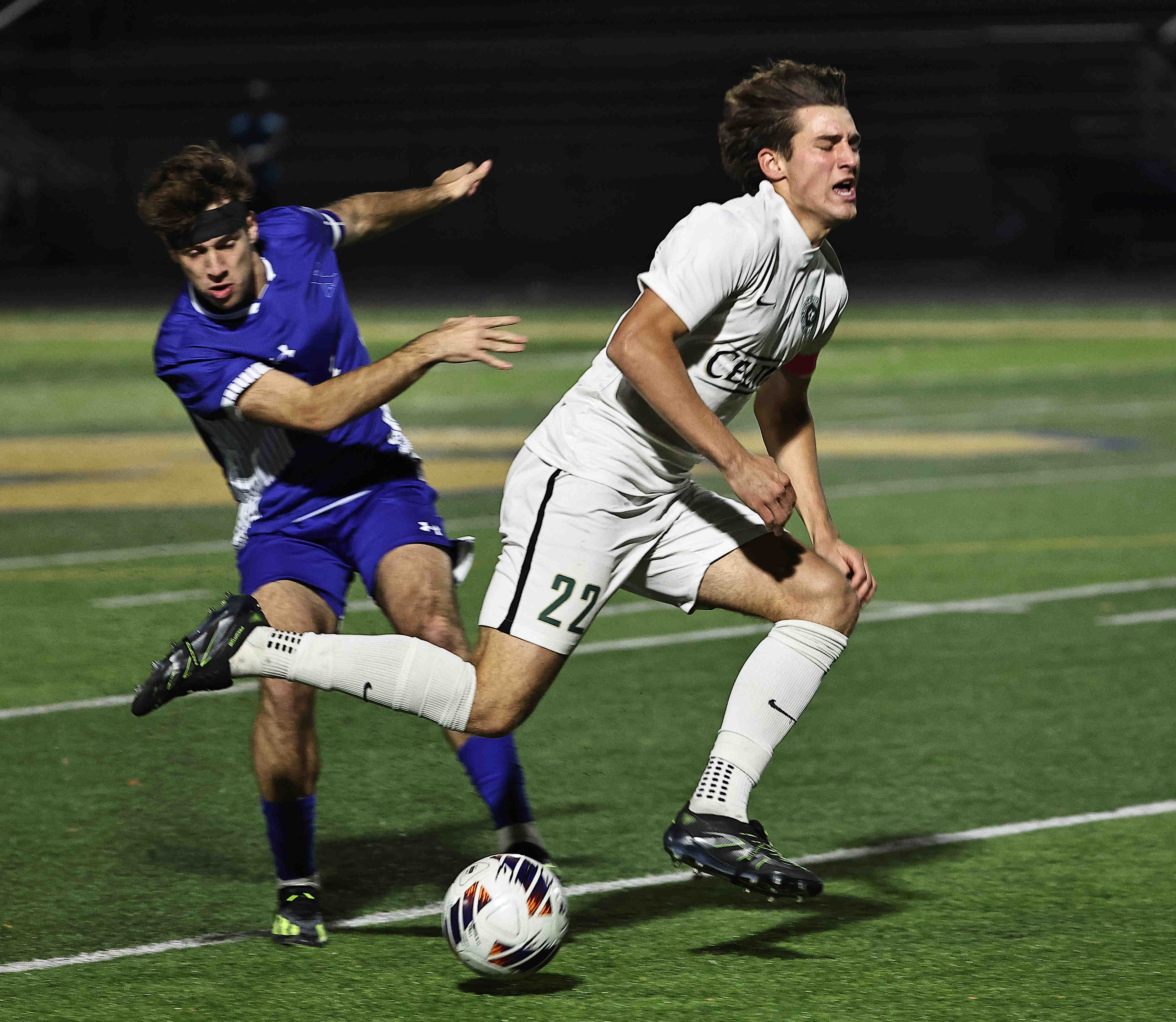 Dublin Jerome's Cal DeWalt (22) is tripped up by St.Xavier's Alex Haddad during their OHSAA Division I state semifinal Wednesday, Nov. 5, 2025, at Springfield High School.