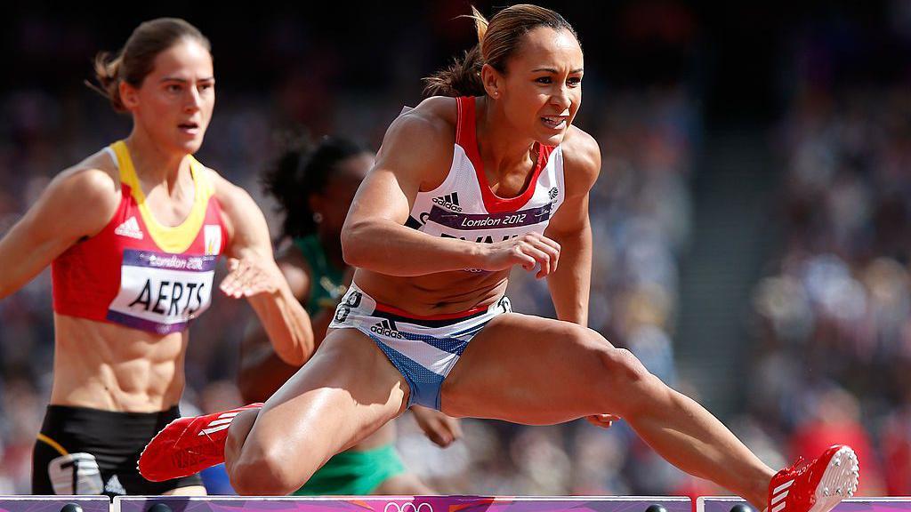 Jessica Ennis-Hill competes in the Women's Heptathlon 100m Hurdles at the London 2012 Olympic Games