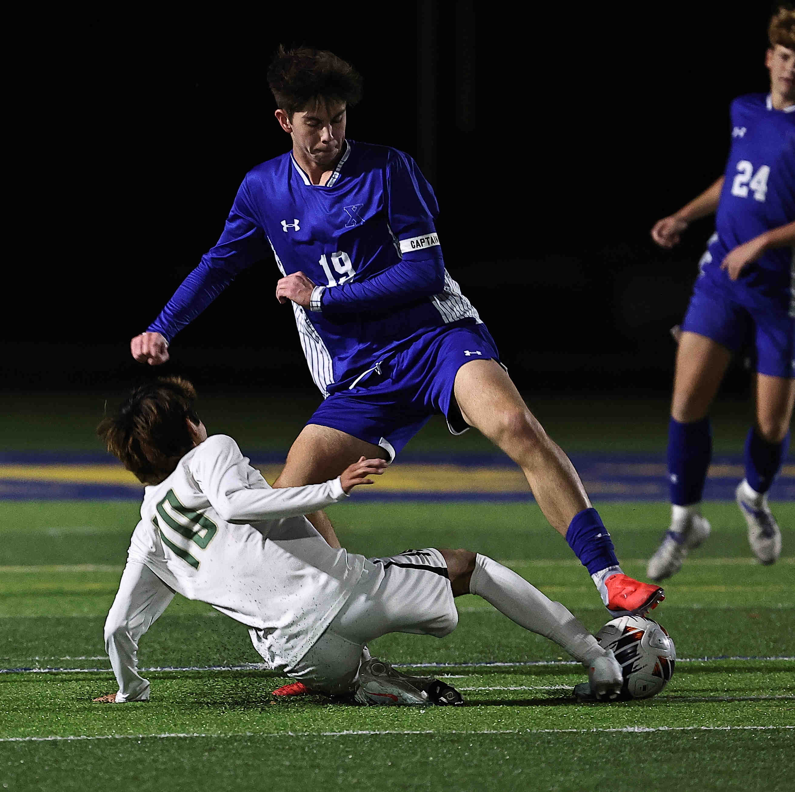 St. Xavier's Will Burkhart (19) battles Dublin Jerome's Jack Jones (10) for the ball during their OHSAA Division I state semifinal Wednesday, Nov. 5, 2025, at Springfield High School.
