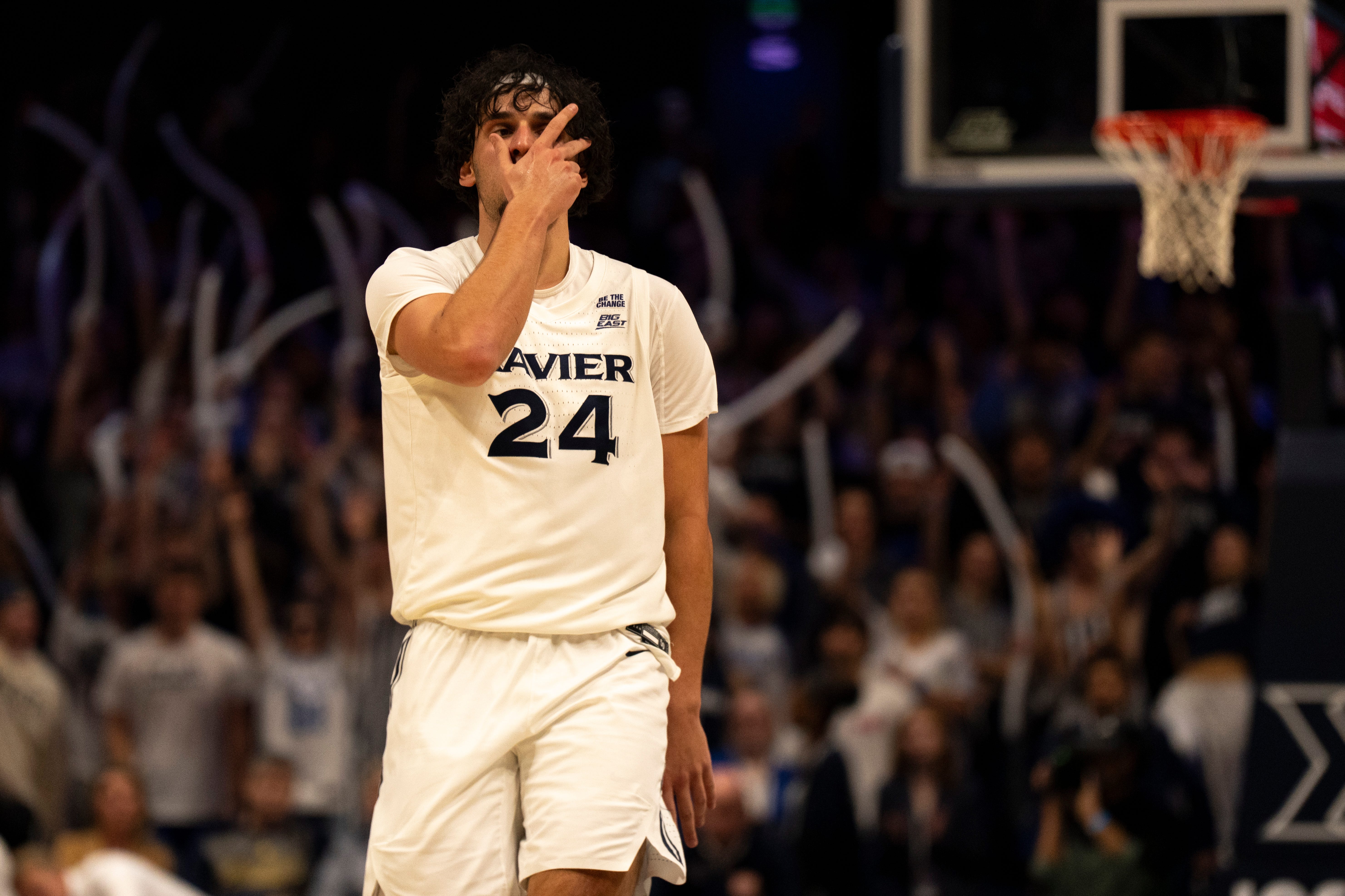 Jovan Milicevic (24) hit a go-ahead 3-pointer in the final two minutes of regulation to help Xavier win its season-opener over Marist, 66-62. Milicevic finished with 14 points off the bench.