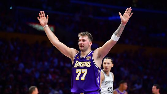 Nov 5, 2025; Los Angeles, California, USA; Los Angeles Lakers guard Luka Doncic (77) reacts after scoring a basket against the San Antonio Spurs during the first half at Crypto.com Arena.