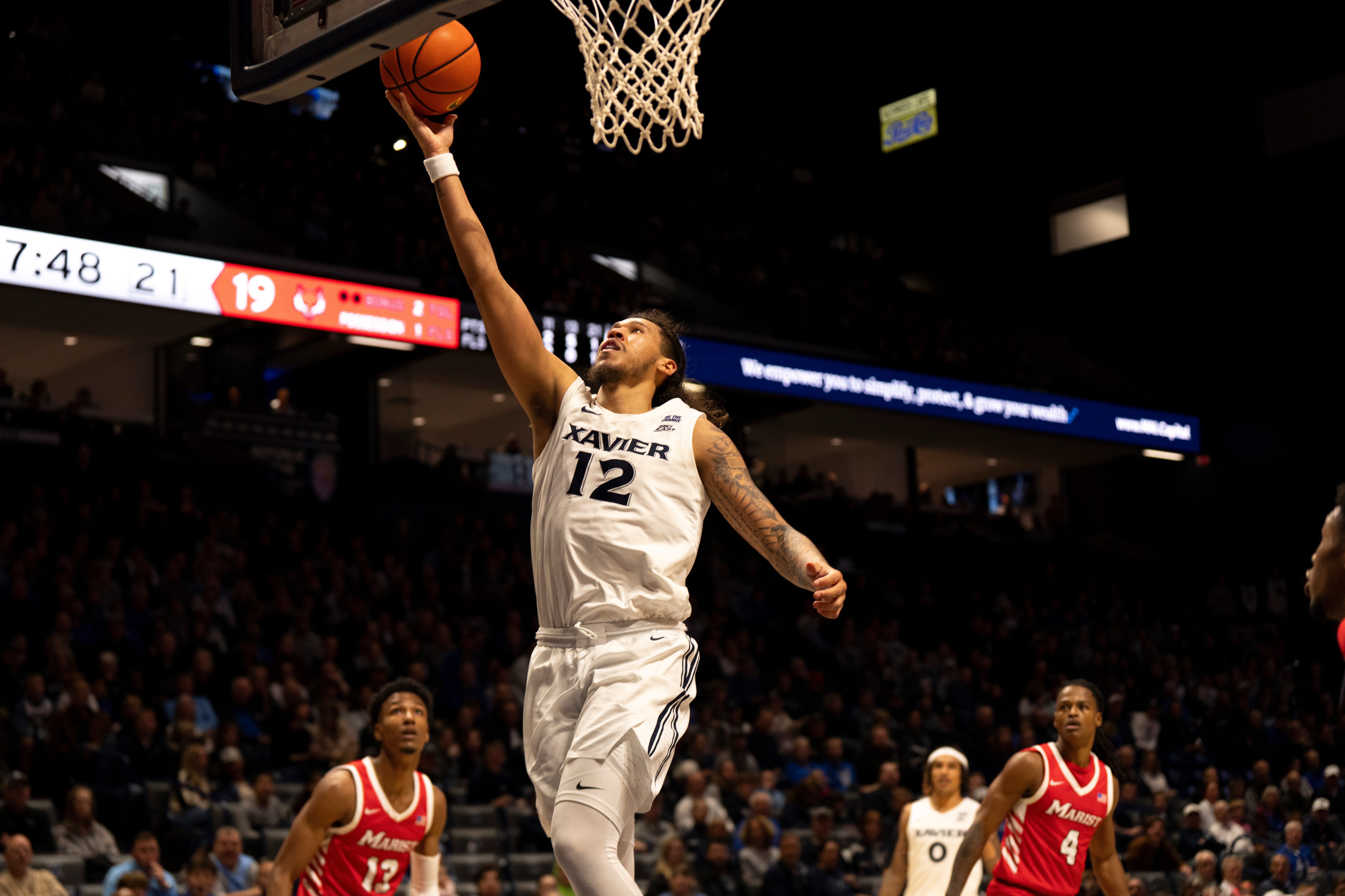 Tre Carroll (12) had 11 points in Xavier's win over Marist.