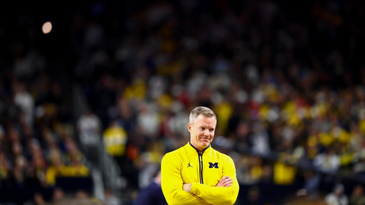 The Coaching Exodus: Dusty May and the Structural Erosion of Collegiate Basketball