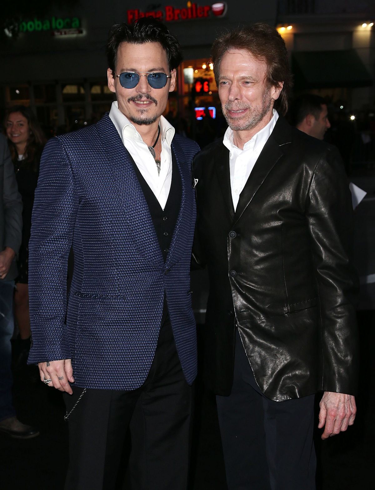 Depp in 'Pirates' Talks: Robbie Leads Franchise Shift Amid Paramount's CA Exit Considerations