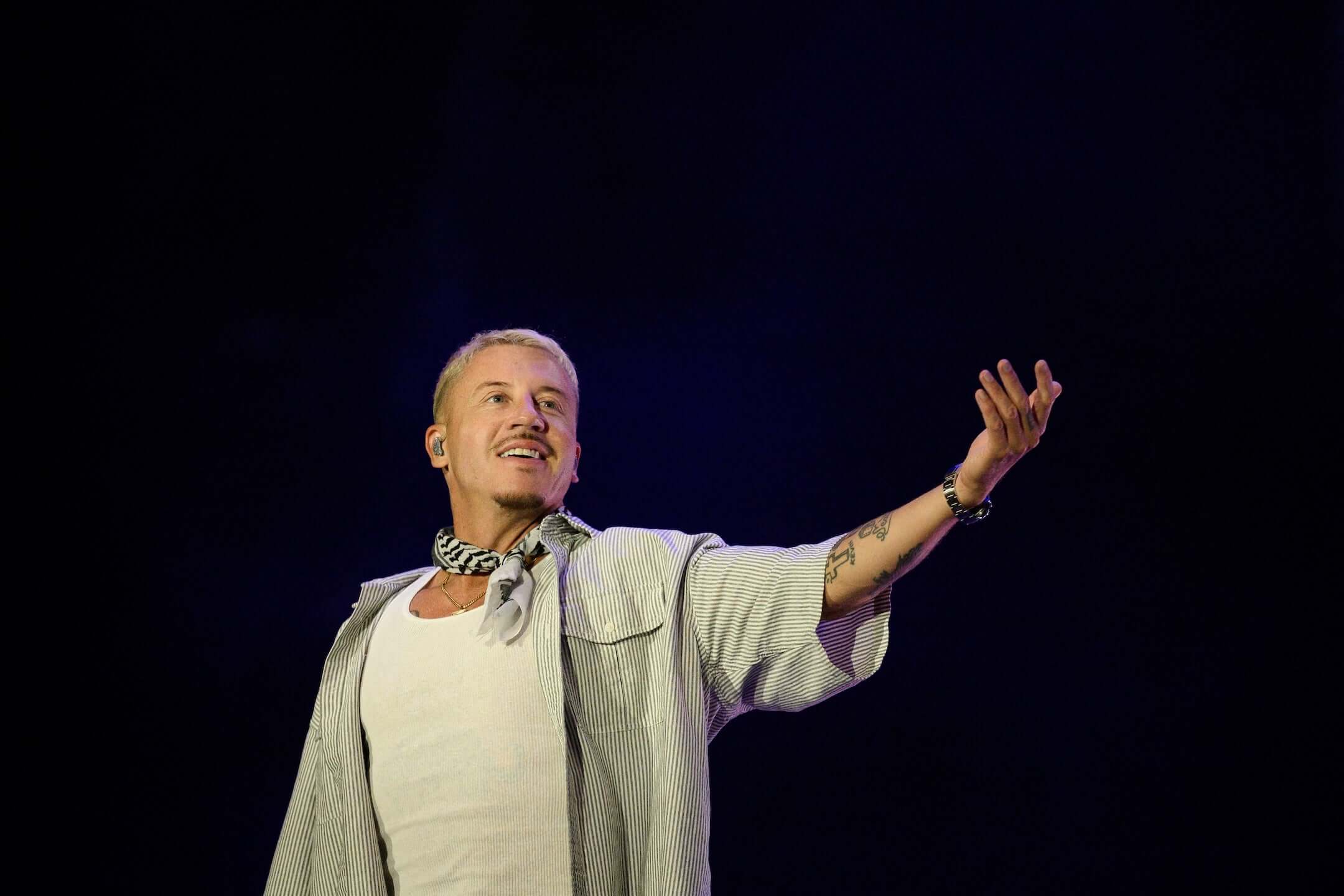 Macklemore's Pro-Palestine Stage Remarks Spark Ed Sheeran Tour Removal Demands