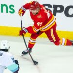 Calgary Flames Enforce Accountability: Zary and Kuznetsov Scratched for Vancouver Clash